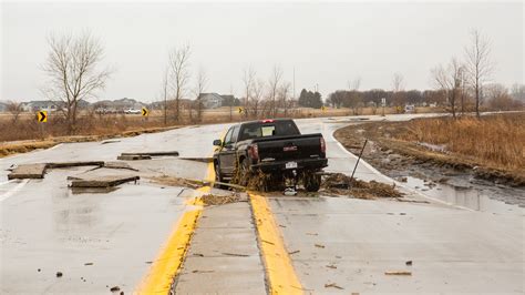 Like ‘House Arrest’: Flooded Roads and Swamped Bridges Strand ...