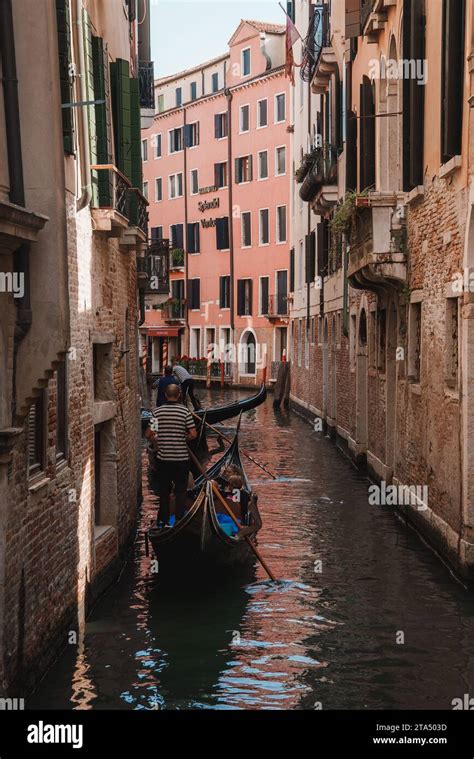 Tranquil Gondola Ride Through Venices Iconic Canals Serene Waterway