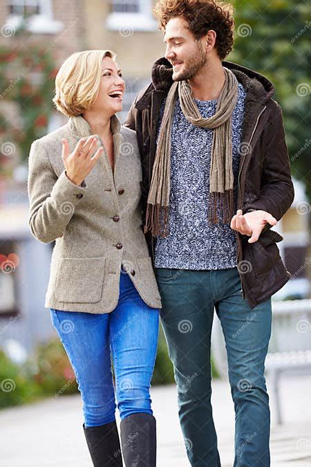 Young Couple Walking Through City Park Together Stock Image Image Of