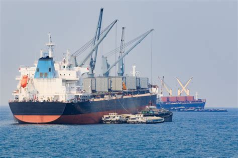 Container Boat Loading Goods Over Clear Blue Water Sea Use For V Stock