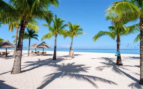 Premium Photo | Woman on a tropical beach in mauritius, a women on ...