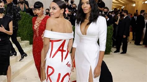 Aoc Defends Tax The Rich Dress Worn At Met Gala 2021 Says Medium Is The Message