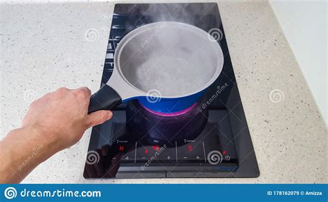 Boiling Water In A Cooking Pot On Induction Hob Stock Image Image Of