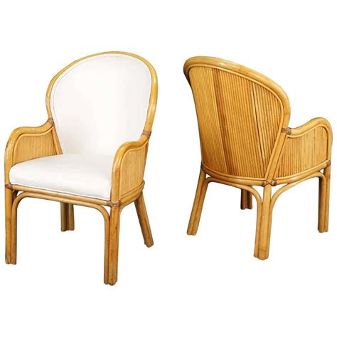 Set Of Ten Rattan Frame Chairs With White Upholstery In The Style Of