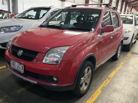 2005 HOLDEN CRUZE N A YG RED 4 SP AUTOMATIC 4D WAGON City Motor Auction