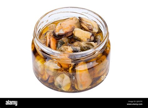 Marinated Mussels Isolated In A Jar On A White Background Full Depth