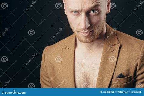 Portrait Of Adult Man Of Caucasian Appearance Isolated On Black