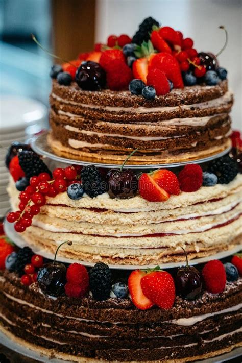 Three Tiered Naked Cake With Fresh Berries Stock Image Image Of Strawberries Party