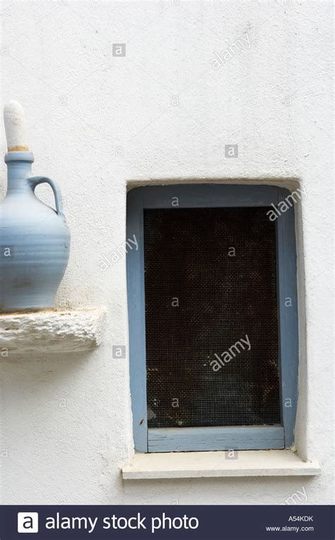 Picturesque Traditional Window And Blue Vase Greek Island Stock Photo