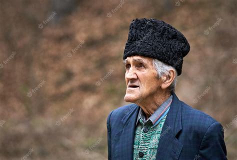 Premium Photo | Old farmer closeup portrait outdoor in the forest