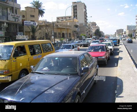 BAGHDAD, Iraq - Drivers fight traffic on major roads in Baghdad ...