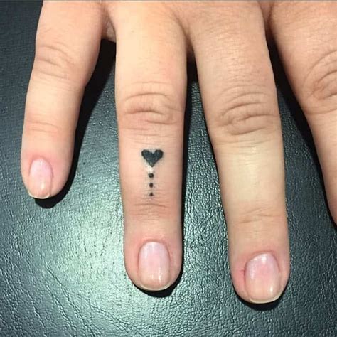 71 Small Heart Tattoo Ideas 2024 Inspiration Guide Hand Heart Tattoo Tiny Heart Tattoos