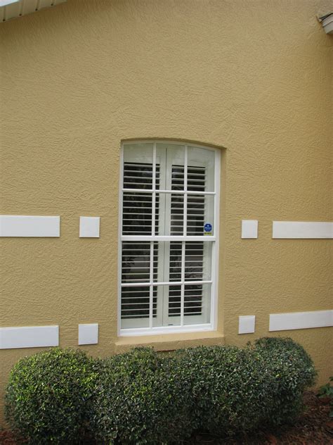 Can my exterior window frames be painted?