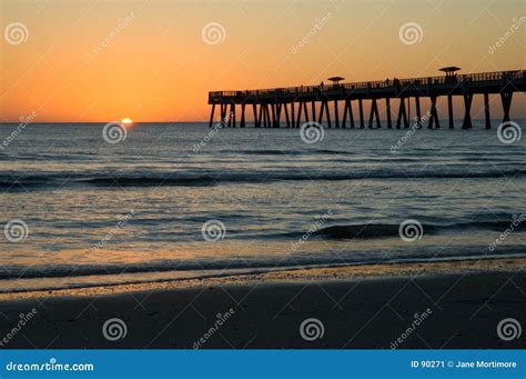 Sunrise Over Jax Beach Pier Stock Image - Image of early, waves: 90271