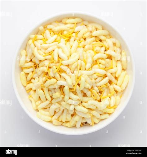 Close Up Of Crunchy Lemon Bhel In A White Ceramic Bowl Made With Puffed