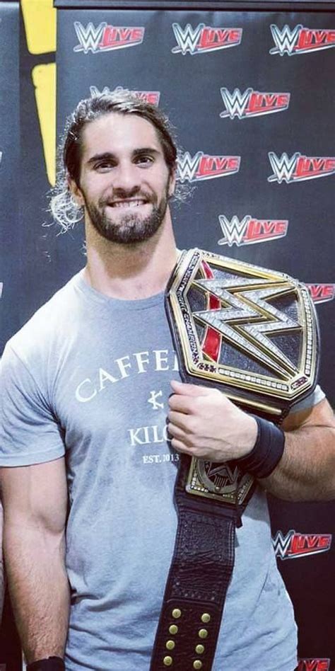 Seth Rollins Smiling With The Wwe World Heavyweight Championship Wwe Seth Rollins Seth Freakin