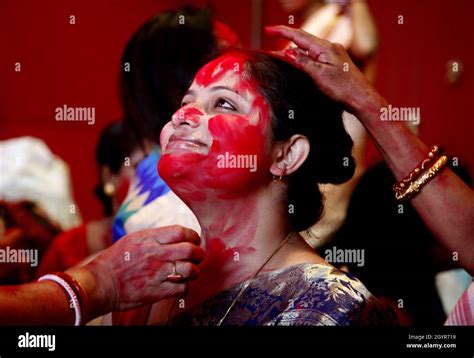 Indian Bengali Women Take Part In A Sindoor Khela During The Durga Puja