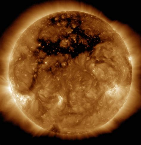 A Massive Hole In The Sun S Corona Is Supercharging Aurorae Right Now