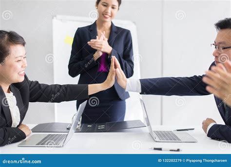 Group Of Asian Business People Hands Clapping After Meeting In Room