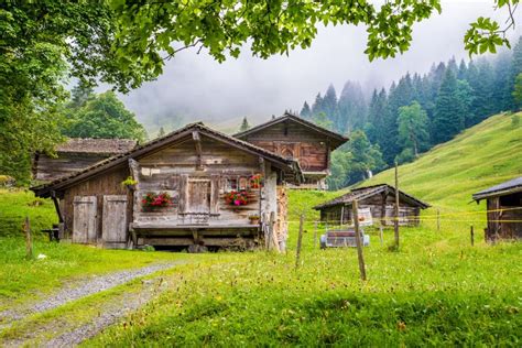 Traditional Mountain Chalets In The Alps Stock Photo Image Of