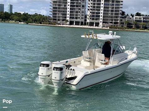 1998 Pursuit 2470 Wa Power Boats Walkaround Boats For Sale In Miami