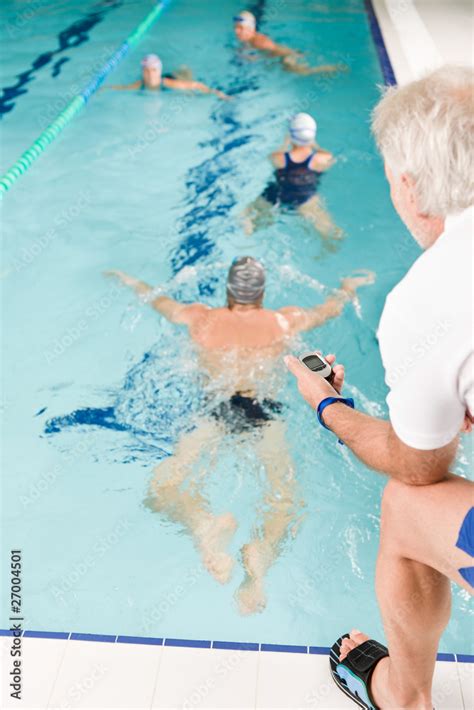 Pool coach - swimmer training competition Stock Photo | Adobe Stock