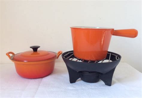 Le Creuset Vintage Cooking Bowl And Fondue Set Orange Catawiki