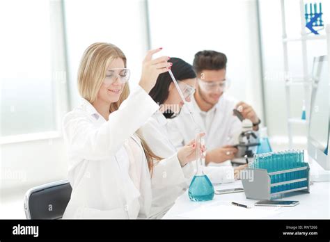 Group Of Scientists Conduct Research In The Laboratory Stock Photo Alamy