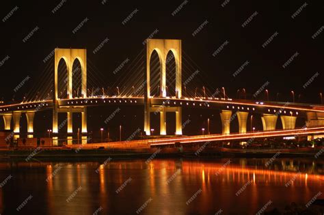 Premium Photo | Macau bridge by night