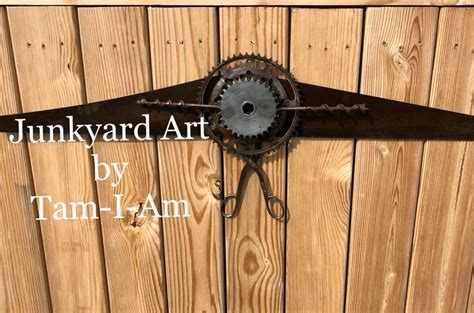 Junkyard Art By Tam I Am Two Hand Saws Two Sprockets Two Drill Bits