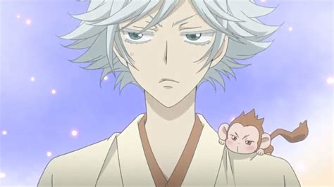 An Anime Character With White Hair Holding A Monkey In His Right Hand