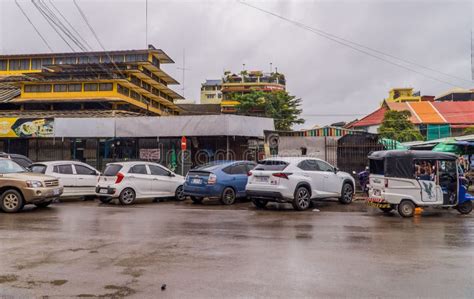 Row Of Parked Cars On The Street Of The Central Market Of Battambang