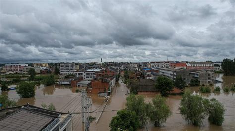 Flooding in China kills 21, as thousands escape to shelters. - The New ...