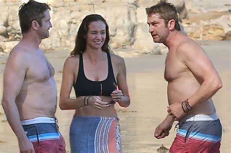 Gerard Butler Lets It All Hang Out As He Cosies Up To Girlfriend On LA