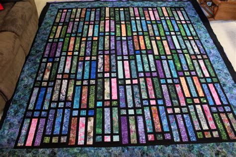 Batik Strip & Frame Quilt – Lady Bird Quilts