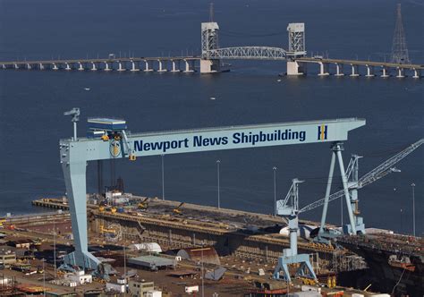 Asbestos found in Newport News shipyard building. Tests show no airborne particles. Workers ...