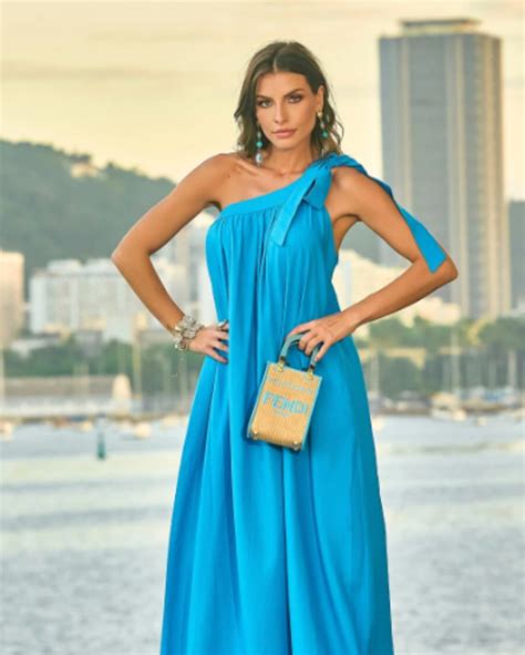 VESTIDO LONGO DE LINHO UM OMBRO SÓ AMARRAÇÃO E BOLSO Djoy Moda