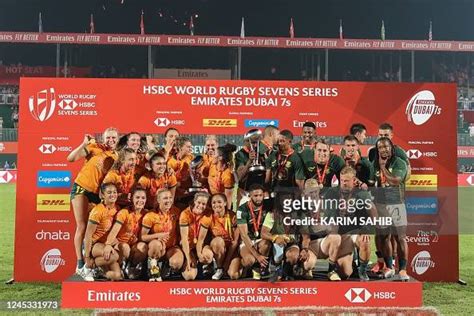 The Australian women's team and South Africa's men's team celebrate ...