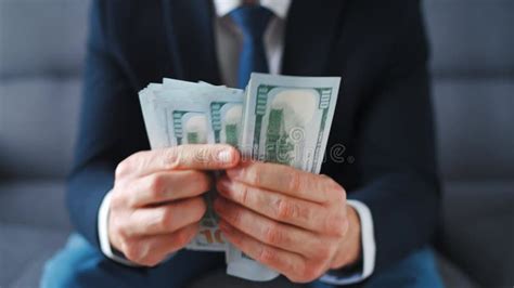 Formally Dressed Man Counting Us Dollar Bills Close Up Stock Footage