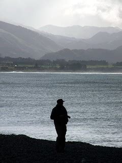 Taking a walk | Taking a walk along a pebble laiden beach at… | Flickr