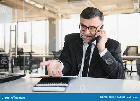 Angry Mad Frustrated Businessman Talking On Phone Complaining On Bad