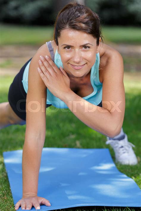 Woman In Plank Pose In Nature Stock Image Colourbox