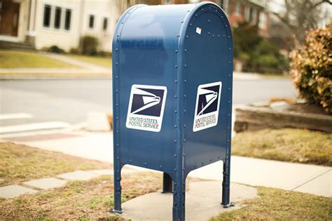 United States Postal Service Mail Box And Truck For Mail Delivery Stock