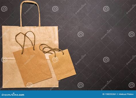 Eco Paper Bag With The Inscription Zero Waste On Black Background Flat