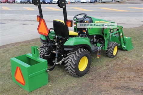 John Deere Diesel Tractor 1023e Comes With Front Loader Bucket And Ballast Box