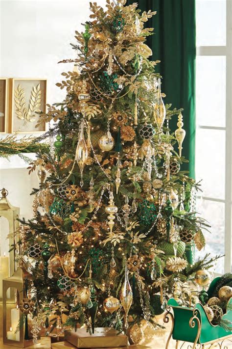 A Christmas Tree With Gold And Green Ornaments