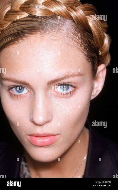 GIVENCHY Backstage Paris Ready To Wear Autumn Winter Model Blonde Hair Off Face Wearing Plaited