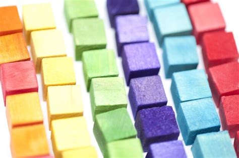 Premium Photo | Rows of colorful toy wooden blocks