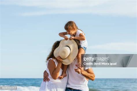 Mother Daughter Kissing Beach Photos And Premium High Res Pictures