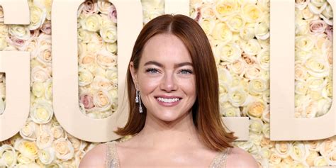 Emma Stone Wore A Floral Naked Dress On The Golden Globes Red Carpet